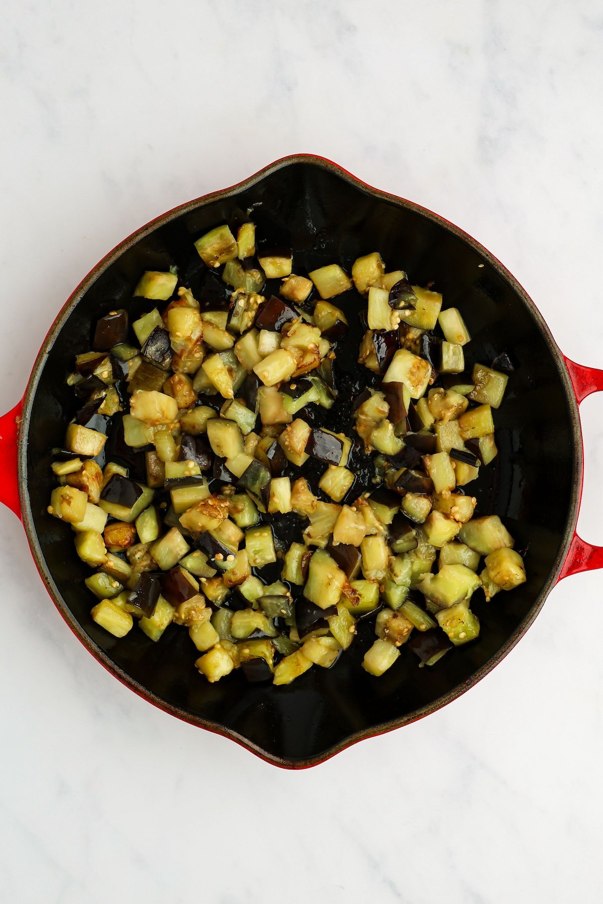 golden brown eggplant in large nonstick skillet