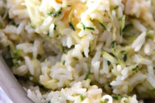 Top view of a pot filled with cheesy zucchini rice.