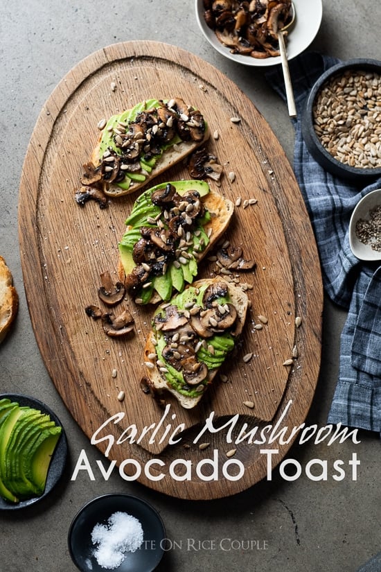Garlic Mushroom Avocado Toast Recipe @whiteonrice Garlic Mushroom Avocado Toast on a cutting board