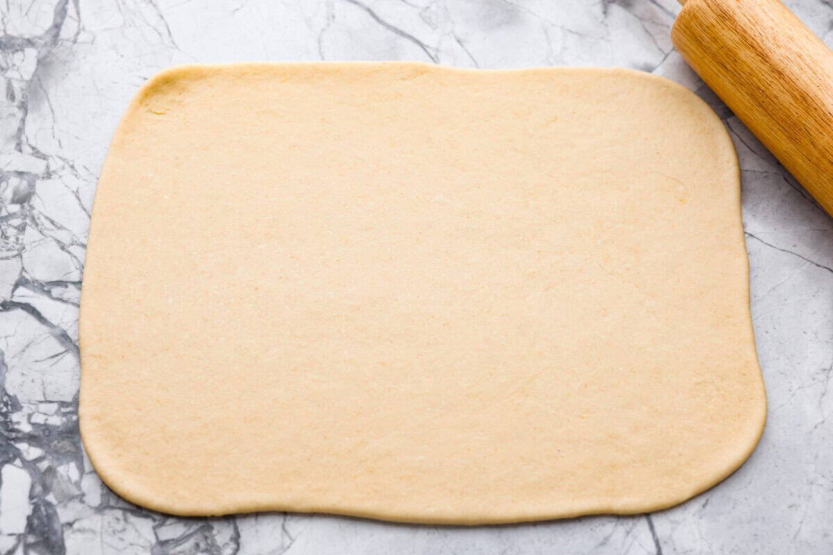 Dough rolled out into a rectangle. 
