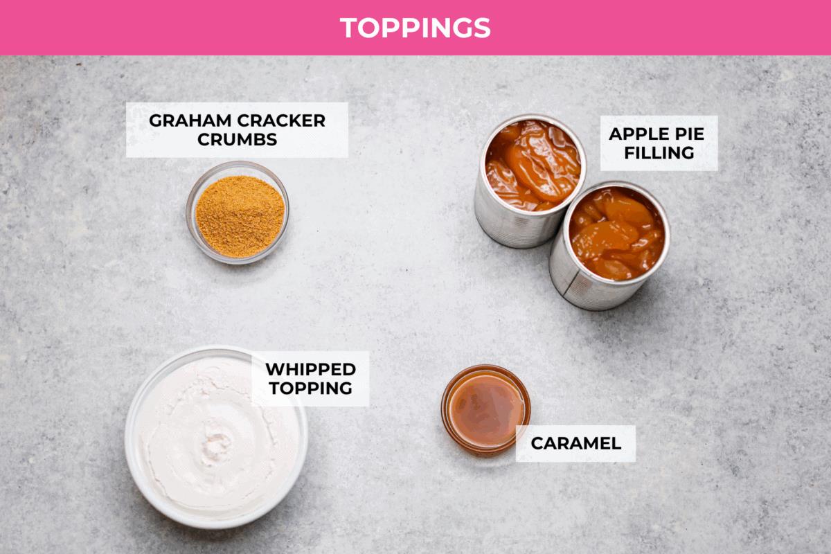 Overhead shot of the labeled ingredients for the topping layer. 