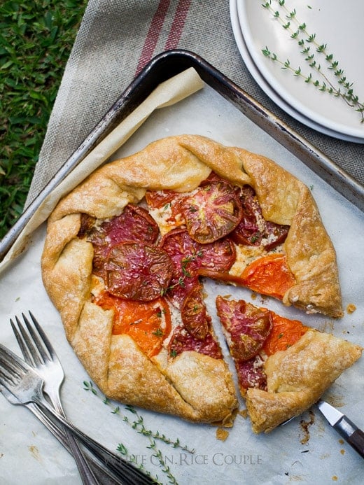 Heirloom Tomato Galette Recipe on WhiteOnRiceCouple.com Heirloom Tomato Galette on a baking sheet