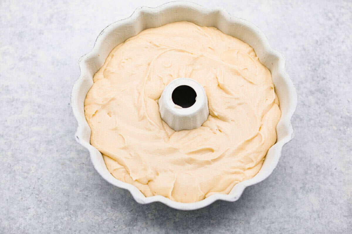 Batter added to the prepared bundt pan. 