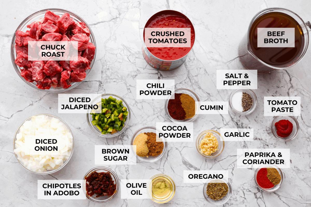 Overhead shot of labeled Texas chili ingredients. 