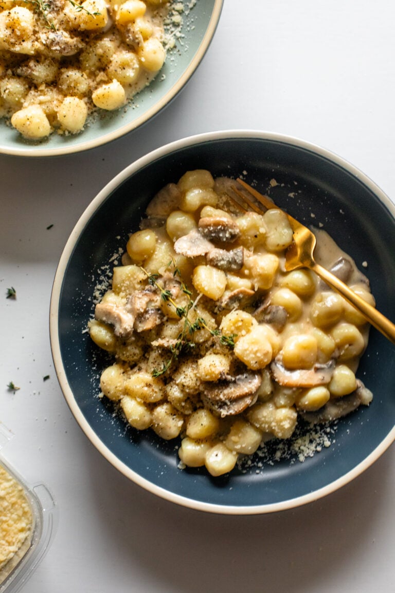 Gnocchi in a bowl with mushroom sauce.