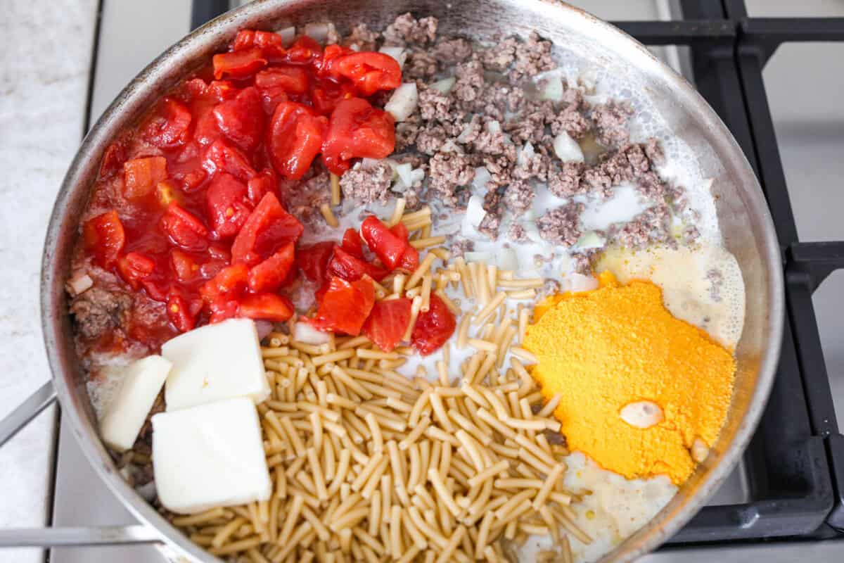 Shipwreck casserole is the ultimate “use what you’ve got” comfort food! Layer it with rice, potatoes, or pasta, toss in any veggies on hand, and make it as cheesy as you like. It’s hearty, budget-friendly, and nearly impossible to mess up! Tomatoes, butter, macaroni, powdered cheese, and milk added to the ground beef mixture.
