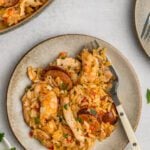 jambalaya on grey plate with fork