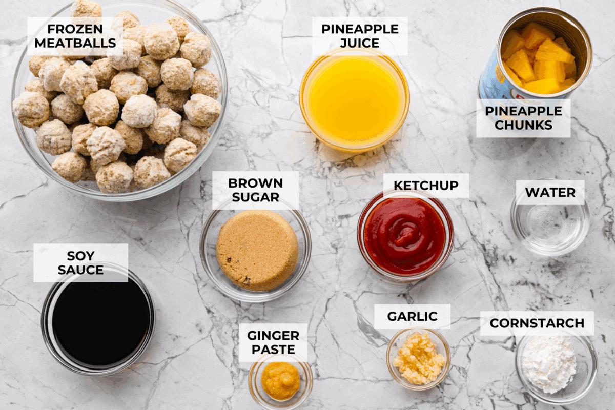 Overhead shot of labeled crock pot huli huli meatballs ingredients.