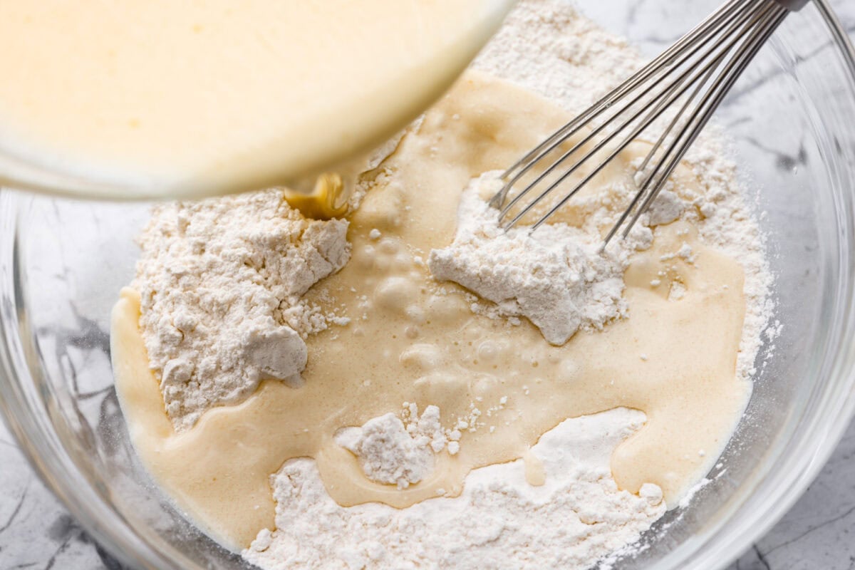 There’s nothing like my homemade Belgian waffles! They're crisp on the outside, soft and fluffy inside, with deep pockets for all the syrup and butter. The secret is whipping the egg whites for that light, airy texture! Wet and dry ingredients added together.