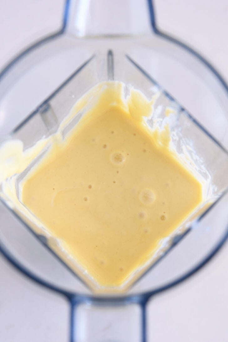 Top down view of cottage cheese pancake batter in blender.