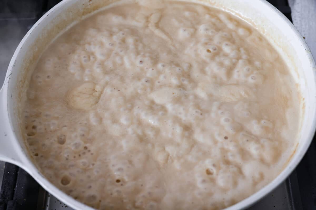 Sauce ingredients simmering to thicken. 