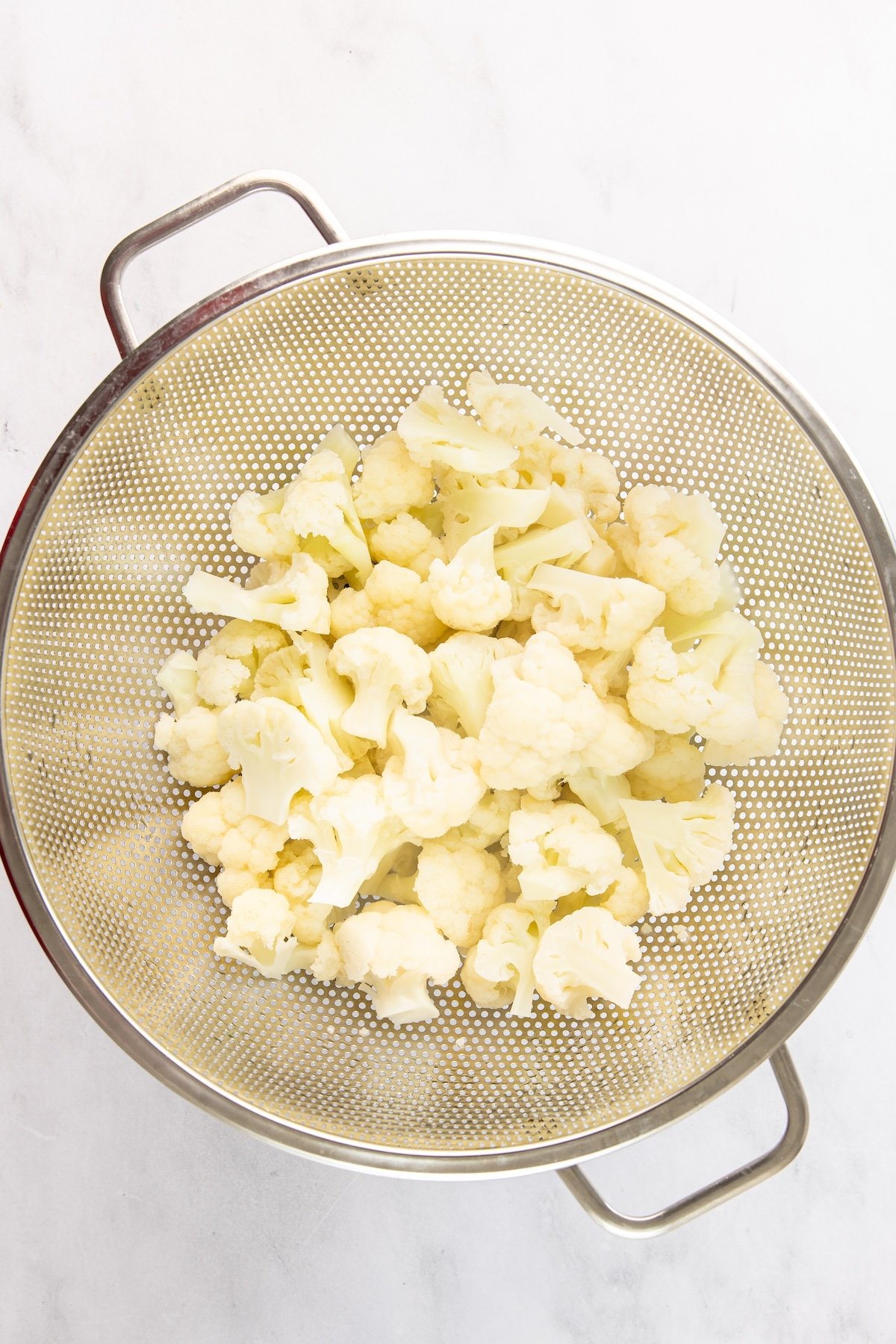 al dente cauliflower in strainer