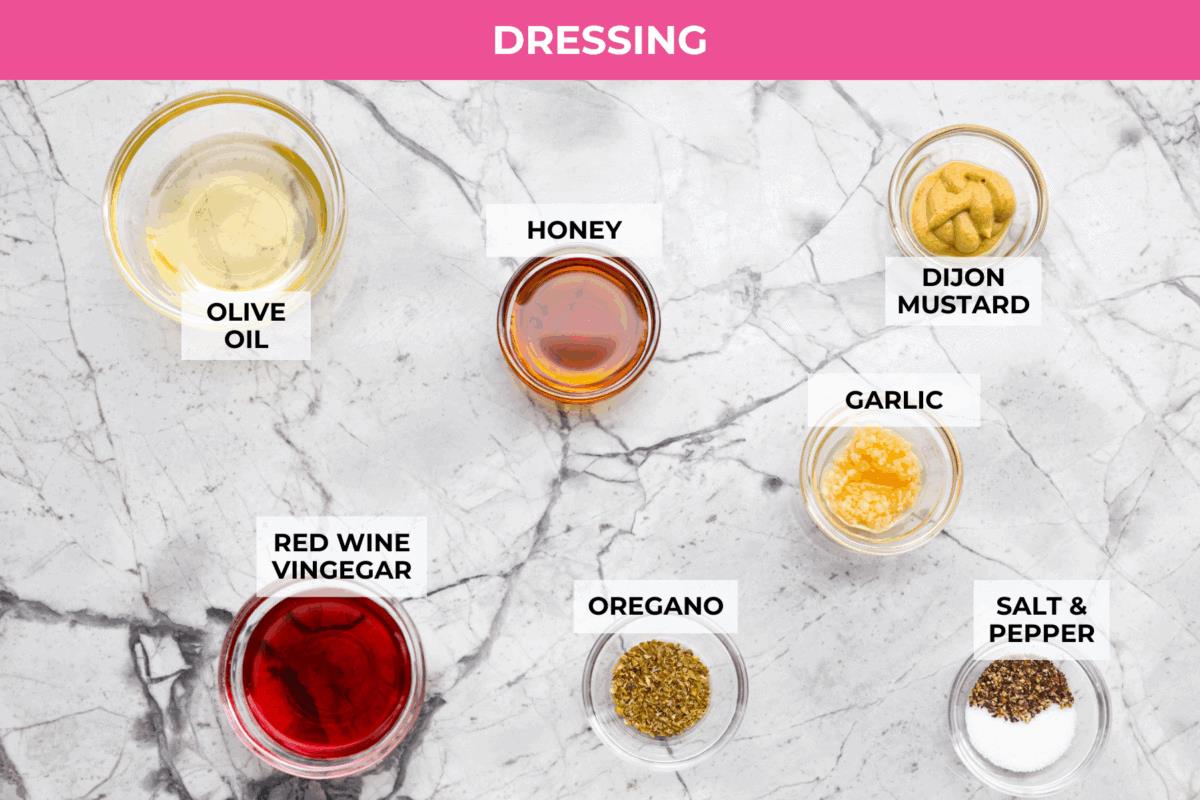 Overhead shot of labeled dressing ingredients. 