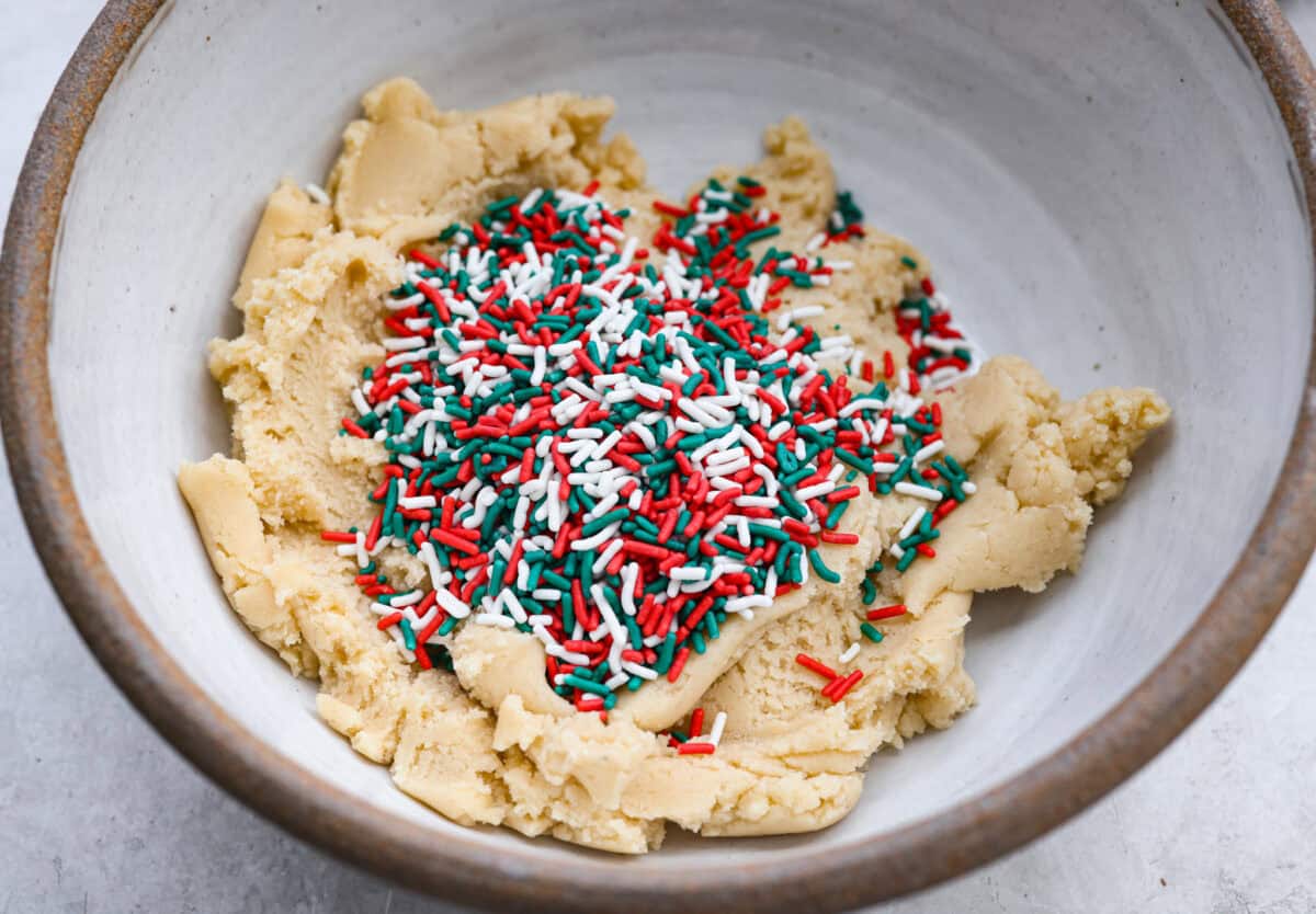Cookie dough with sprinkles added to it. 