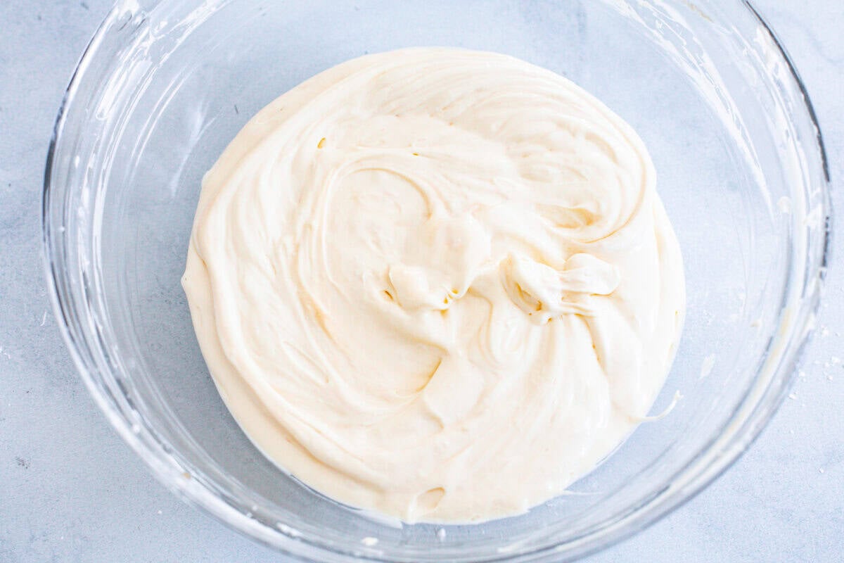 Overhead shot of a bowl of melted white chocolate.