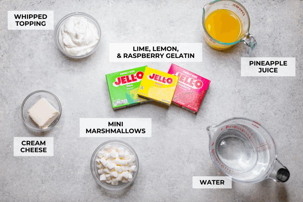 Overhead shot of labeled Christmas ribbon salad ingredients. 