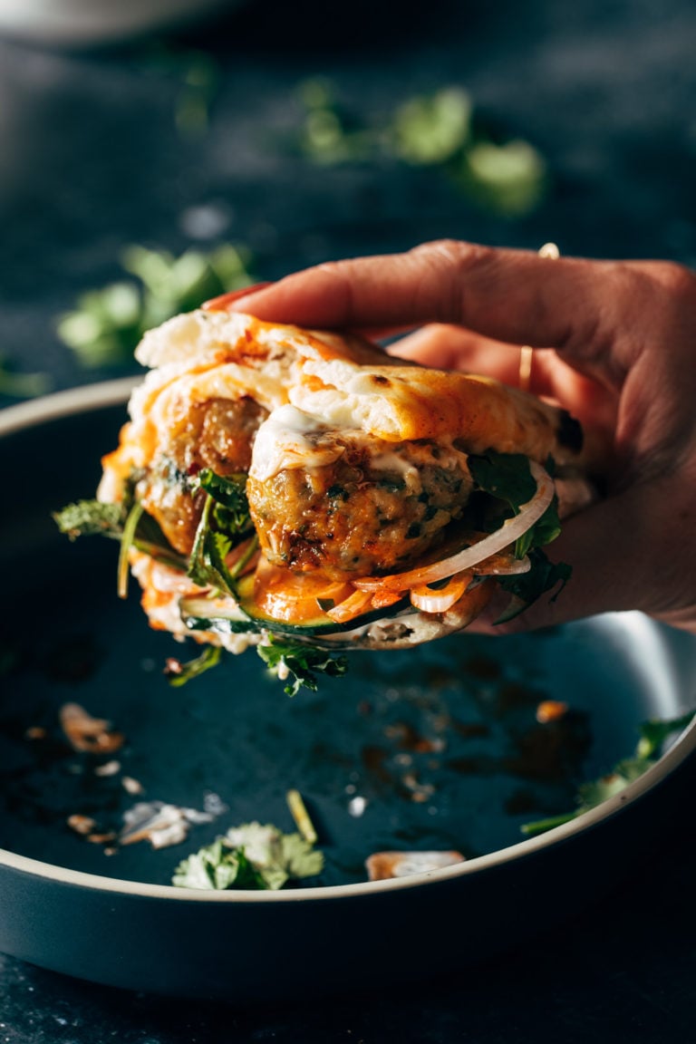 Ginger chicken meatballs in a sandwich.