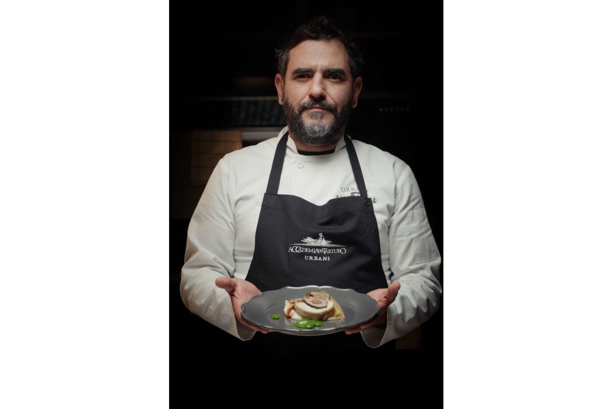 Chef Michele Low of Urbani Tartufi presents gourmet truffle dish. Fine dining.