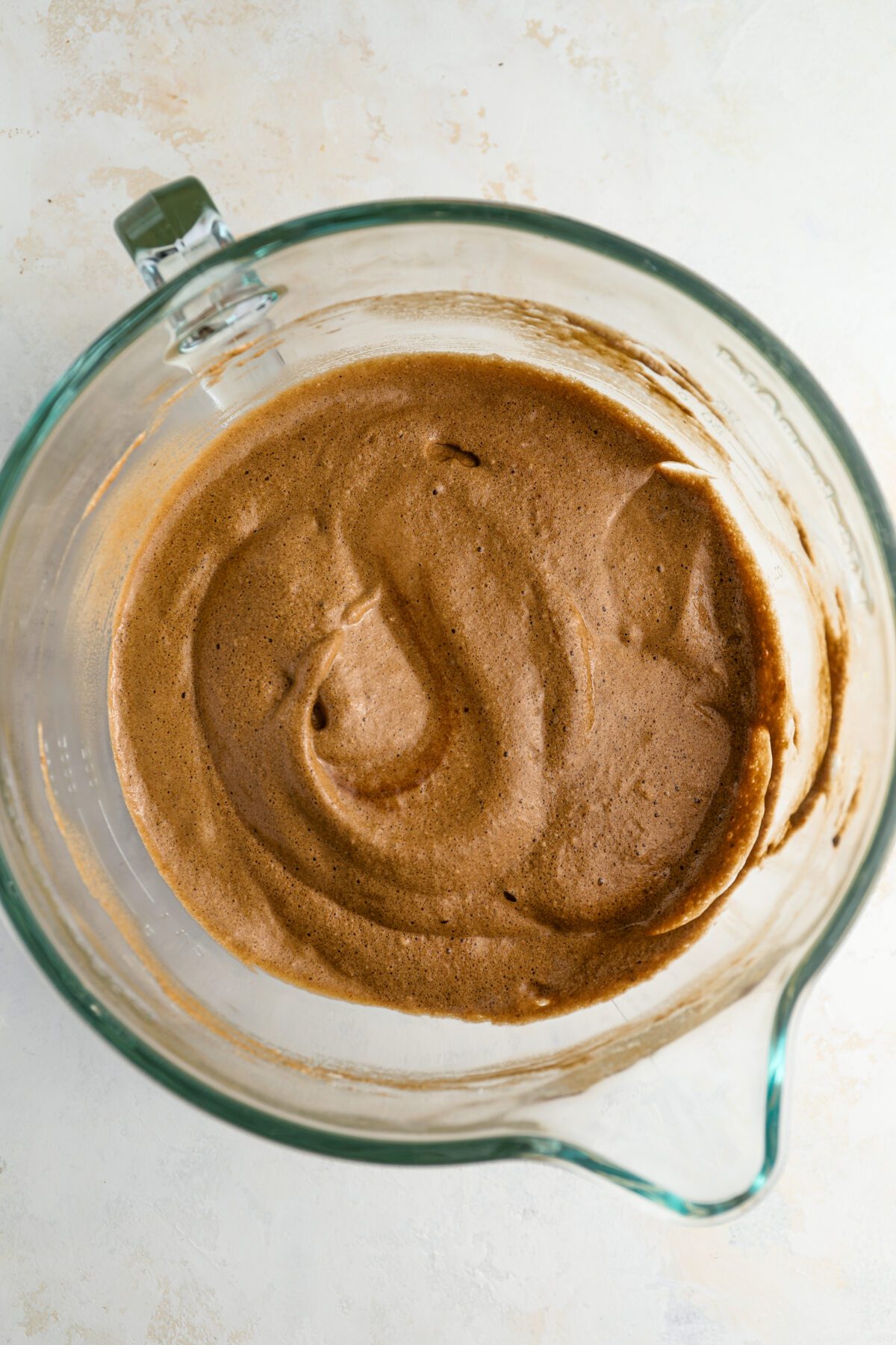 combining the egg yolk mixture and beaten egg whites