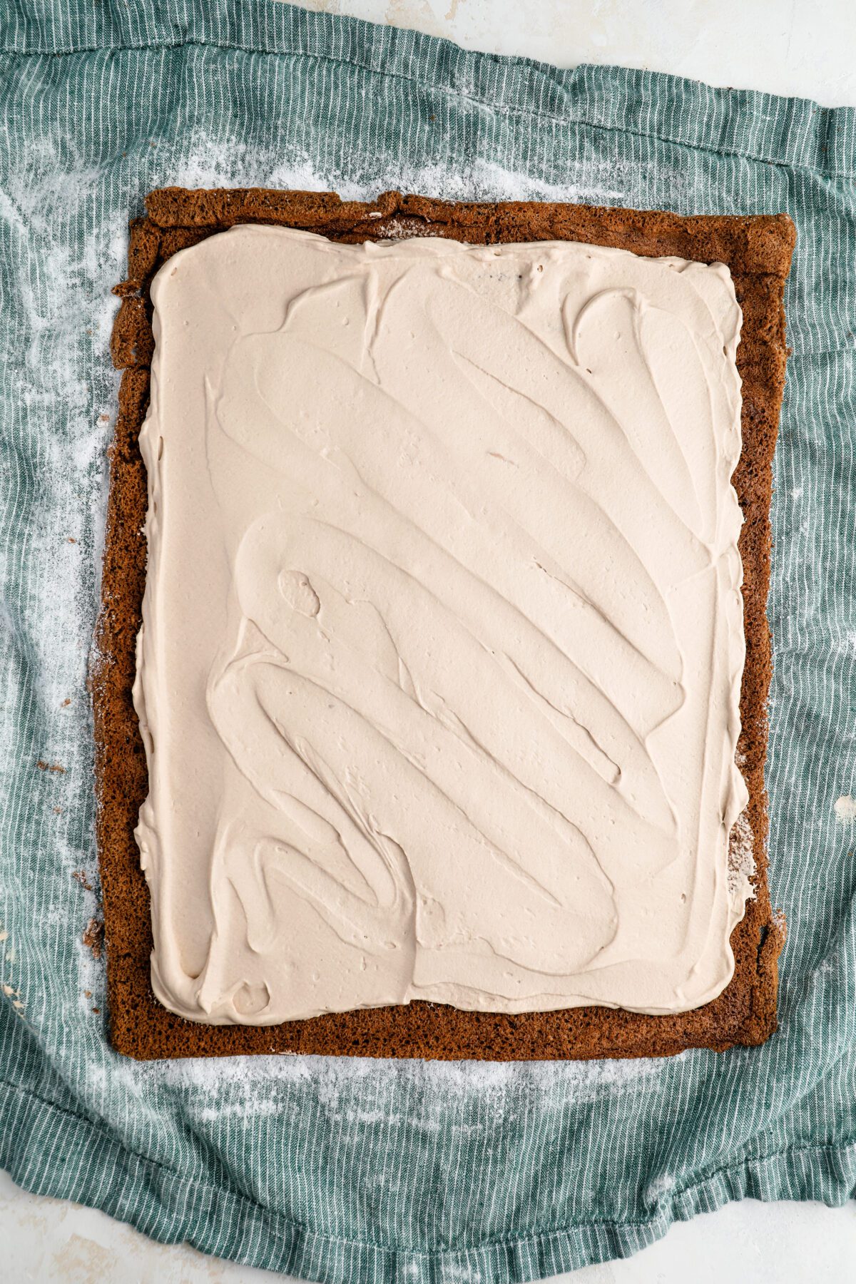 cake with filling spread evenly on top