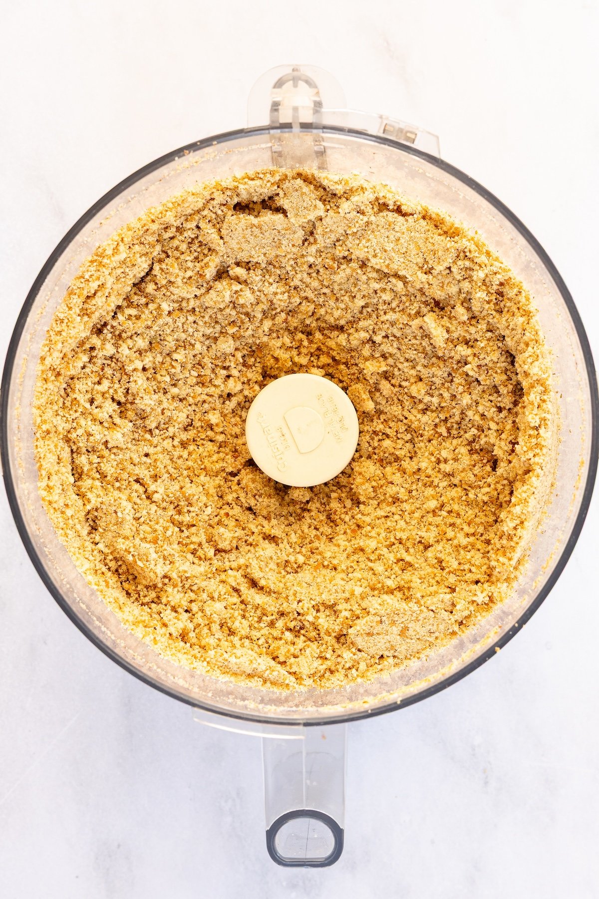 cookies and pecans finely ground in food processor bowl