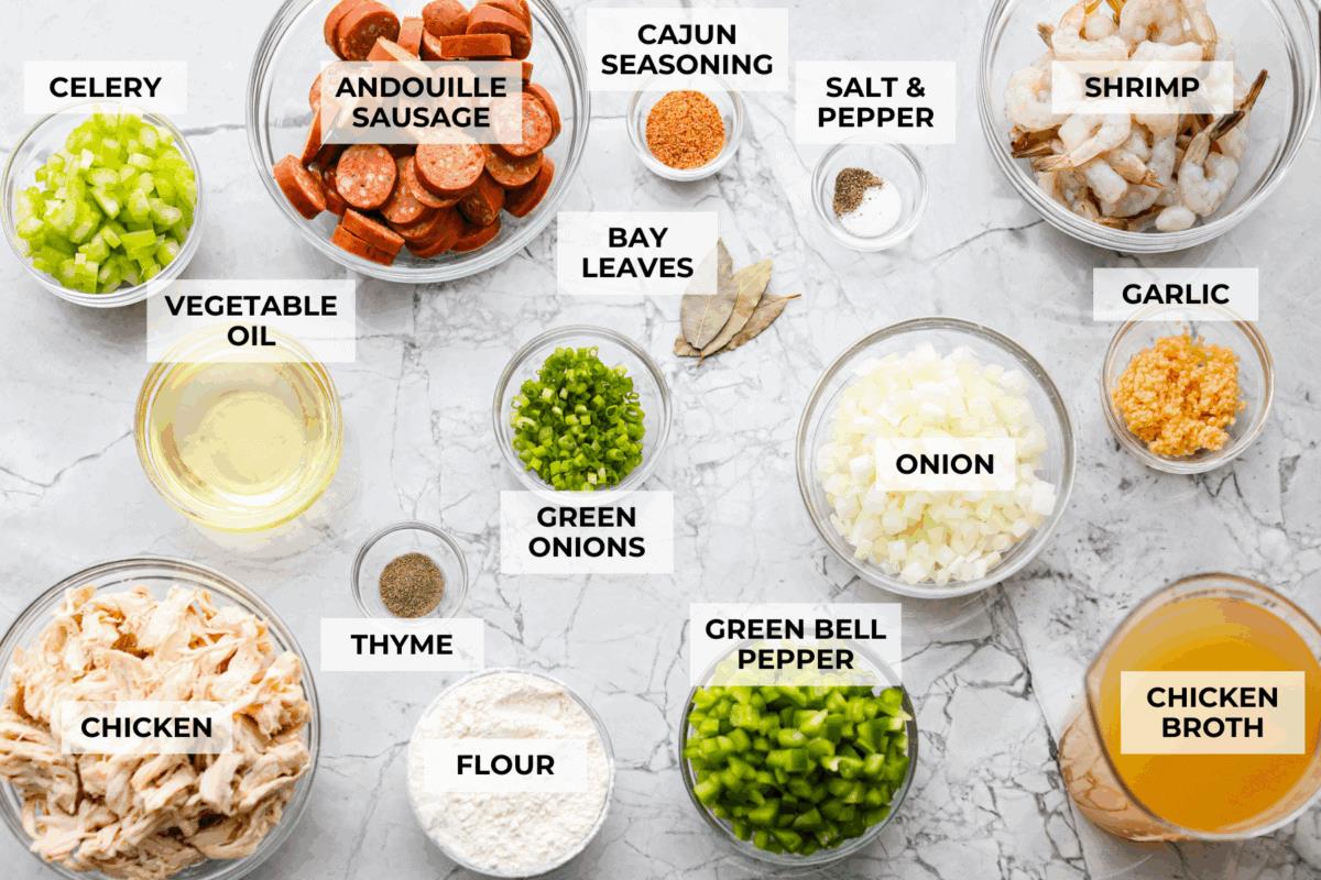 Overhead shot of labeled New Orleans gumbo ingredients. 