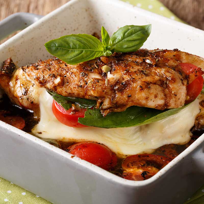 Caprese stuffed chicken with mozzarella and tomato - elegant dinner for two