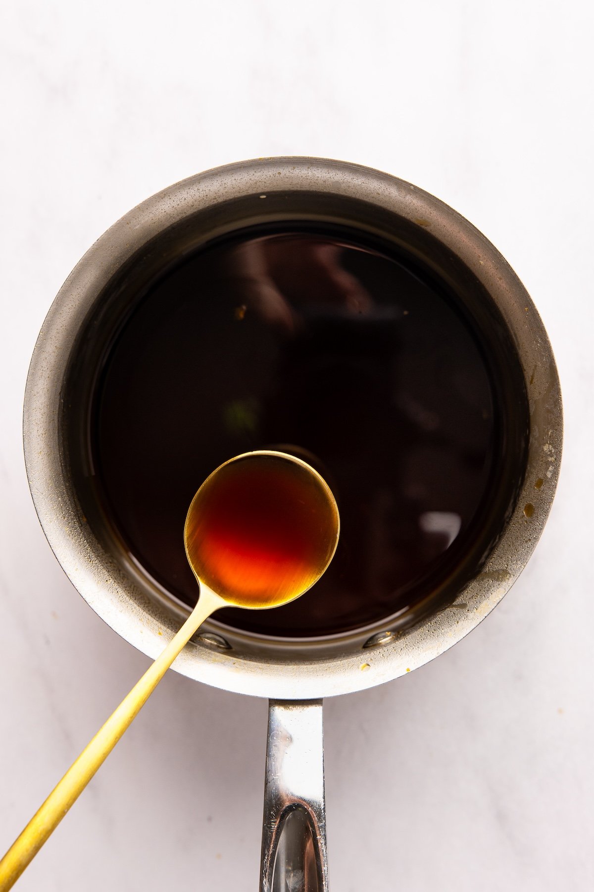 small saucepan with thickened sauce