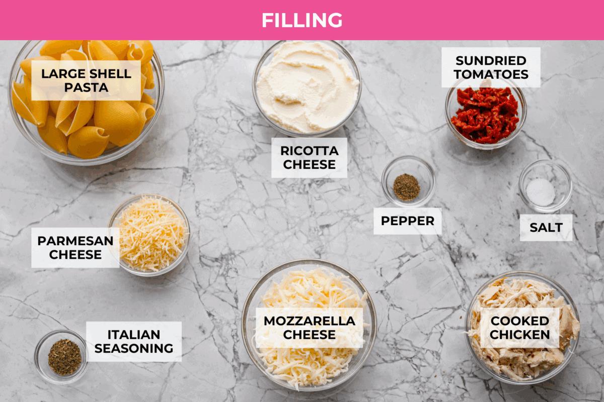Overhead shot of the labeled marry me stuffed shells filling ingredients.
