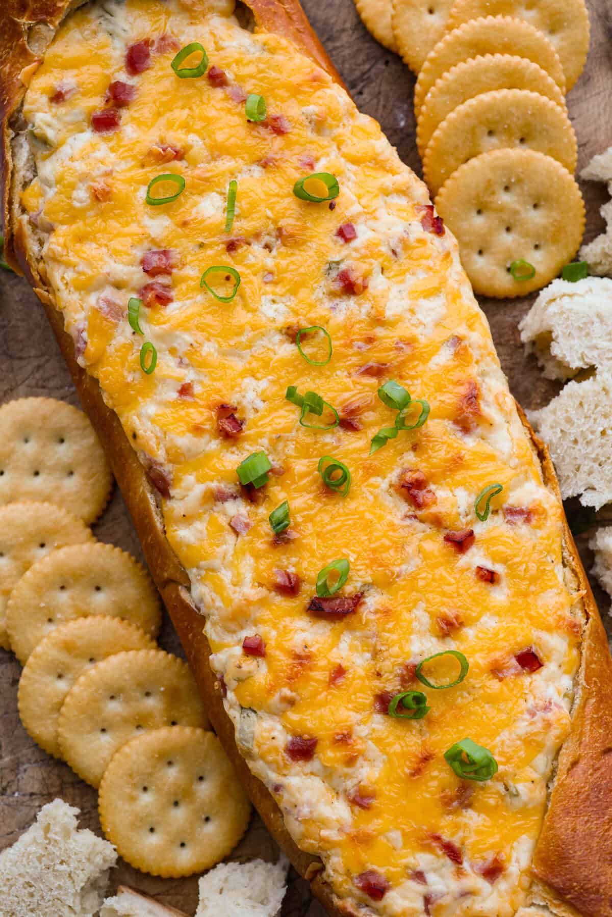 Overhead shot of Mississippi sin dip surrounded by crackers. 