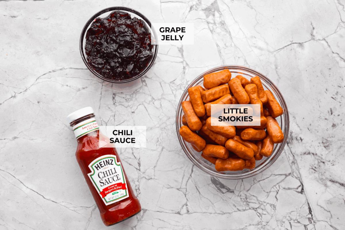 Overhead shot of labeled crockpot grape jelly little smokies. 