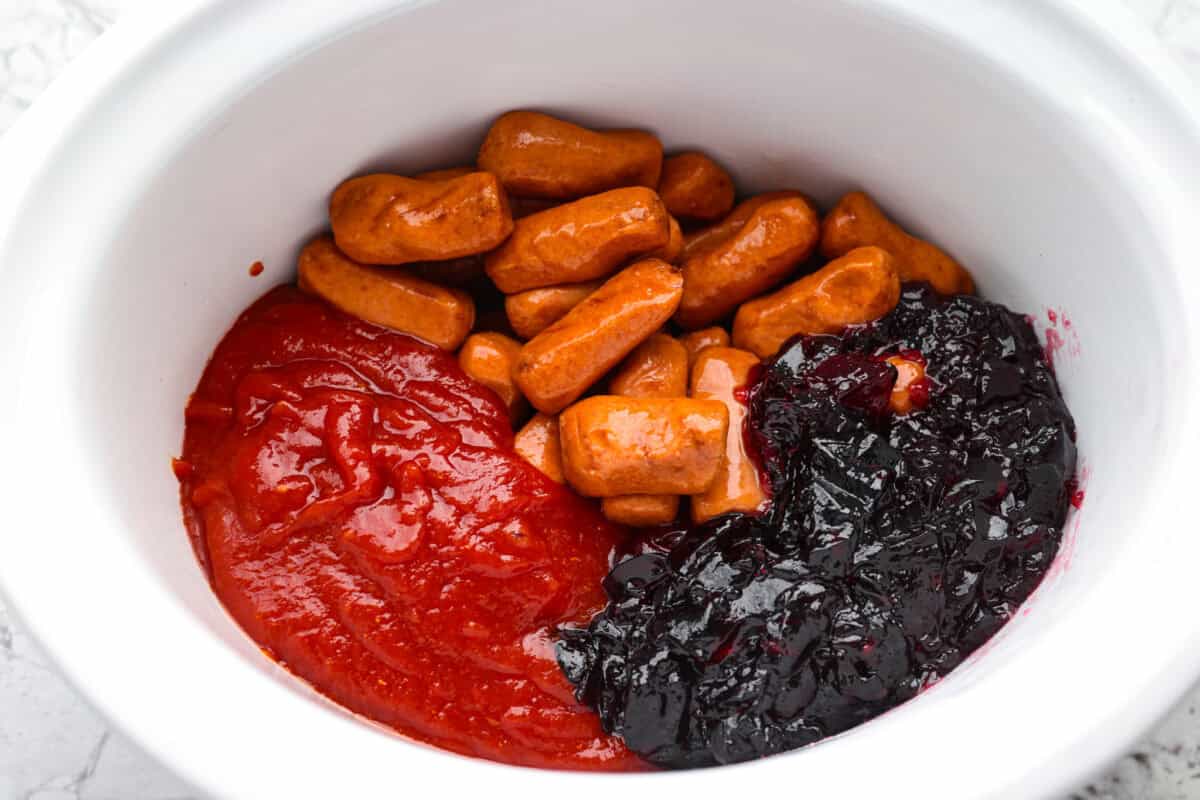 All of the ingredients added to a crockpot.