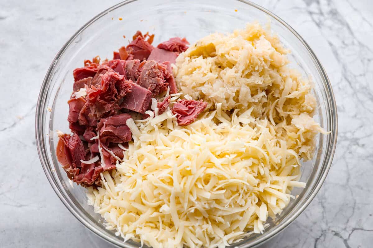 Sauerkraut, corned been and Swiss cheese added to the mixture. 