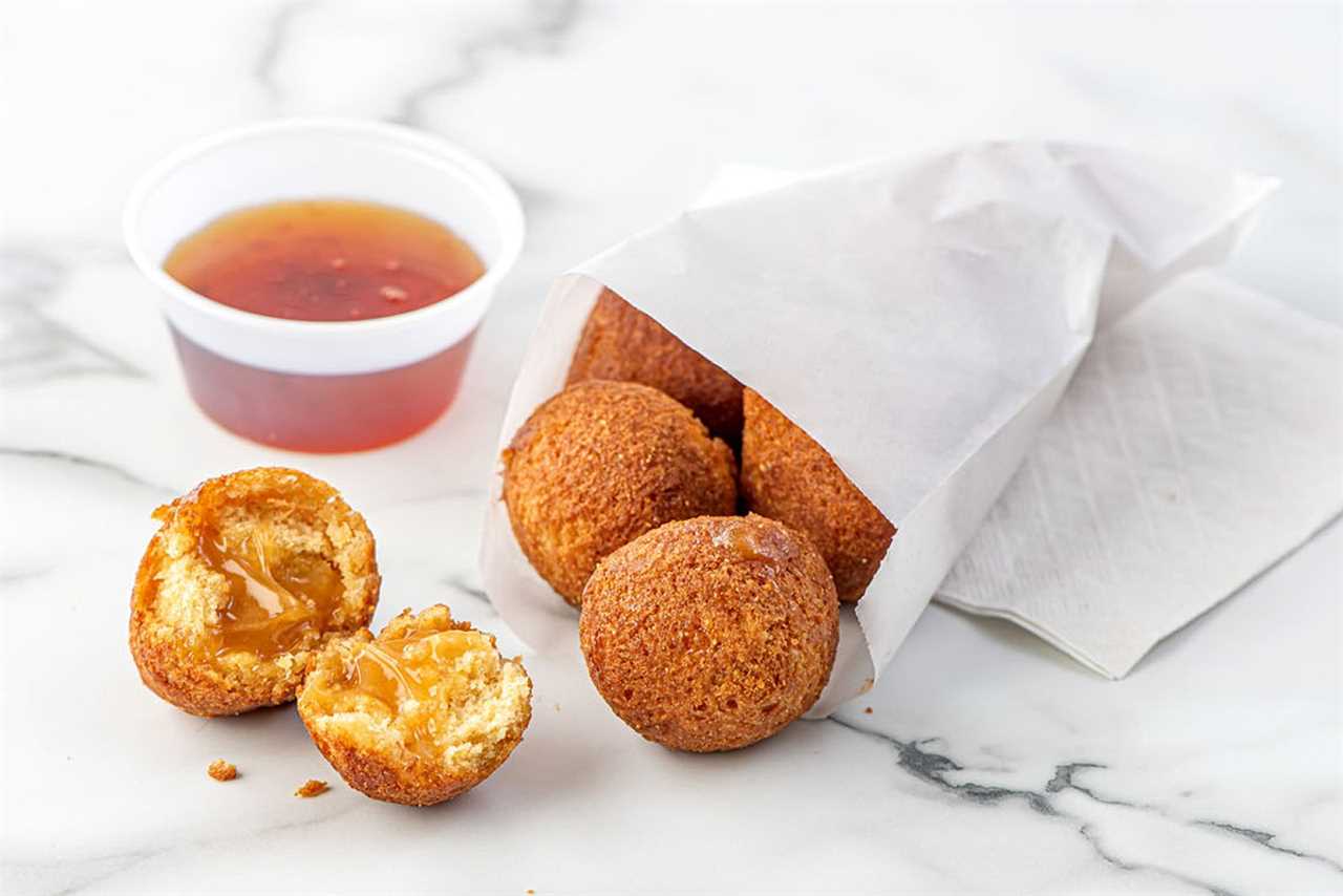 Rich's Cornbread Poppers Filled with Hot Honey From Strawberry Sweet to Honey Heat: Rich's New Filled Donut Bites Satisfy Snackers