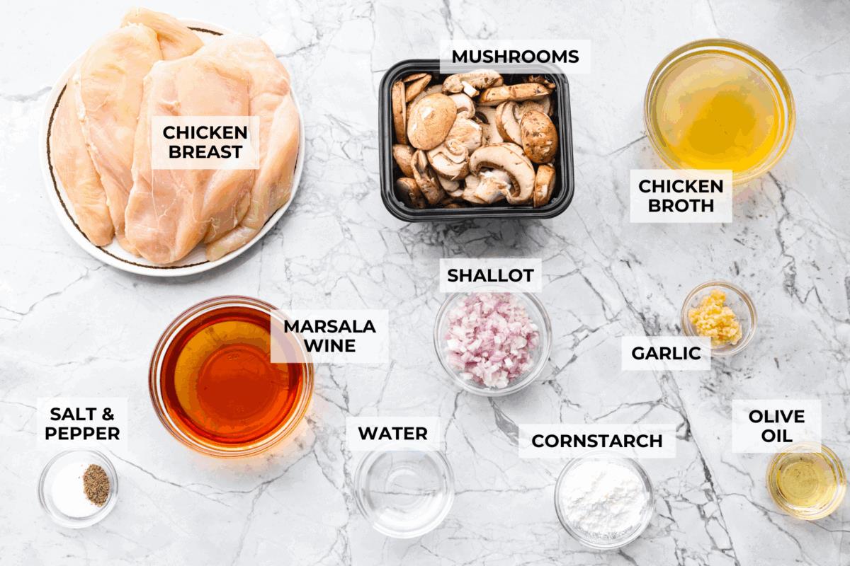 Overhead shot of labeled crockpot chicken marsala ingredients. 