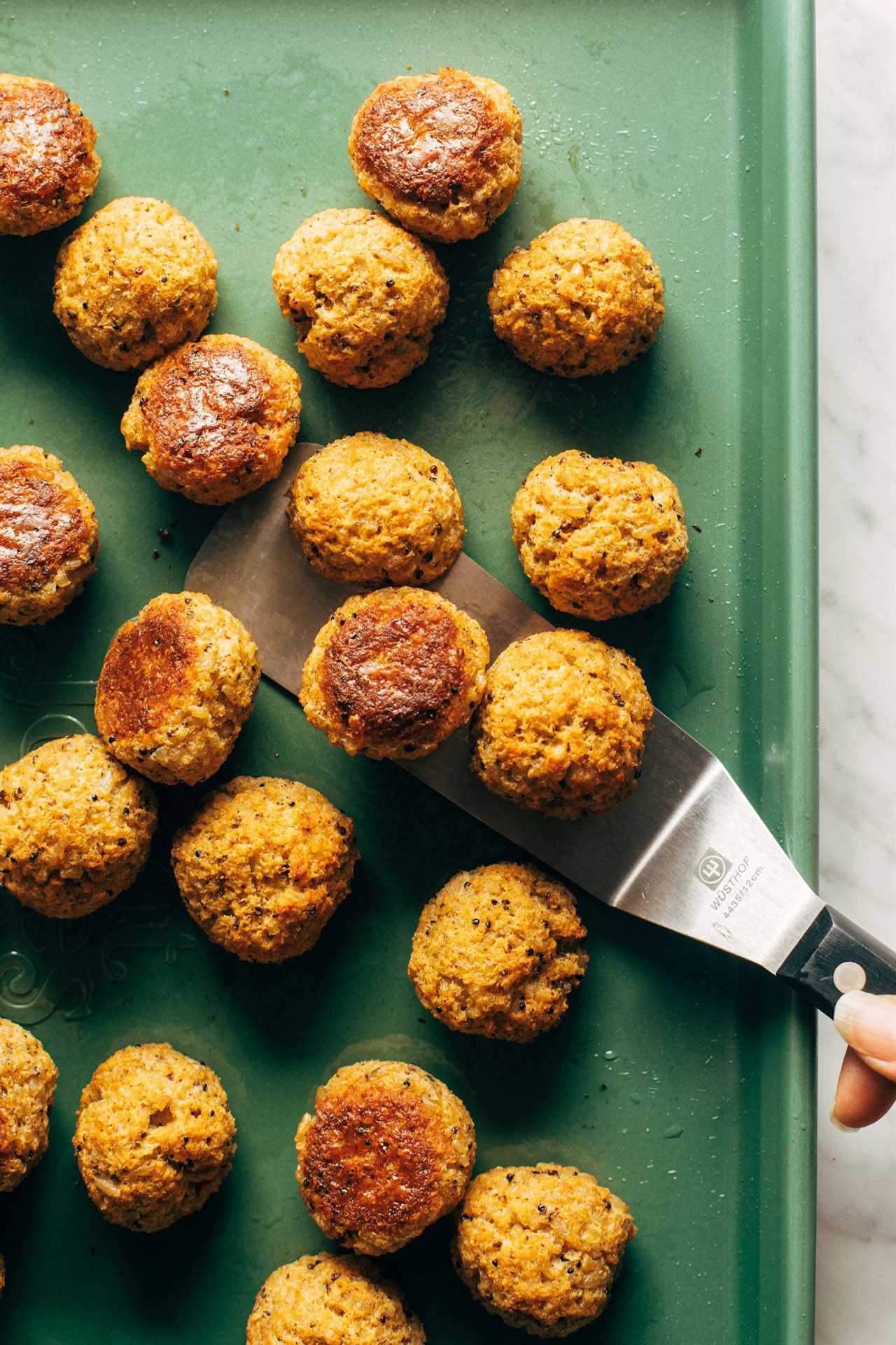 Vegetarian meatballs on a sheet pan.