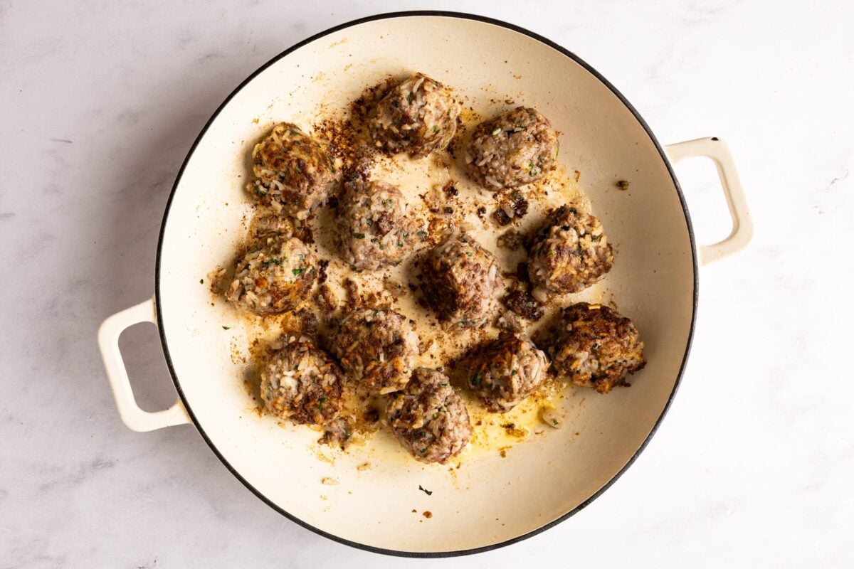 browned meatballs in dutch oven