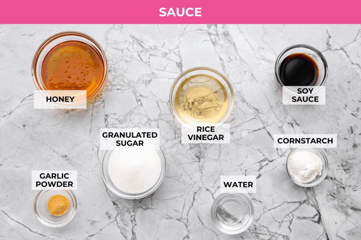 Overhead shot of labeled PF Chang's honey chicken sauce ingredients. 