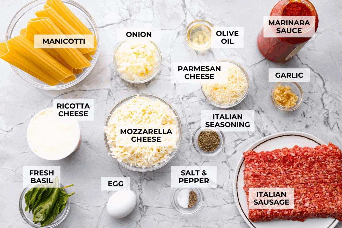 Overhead shot of labeled sausage manicotti ingredients. 