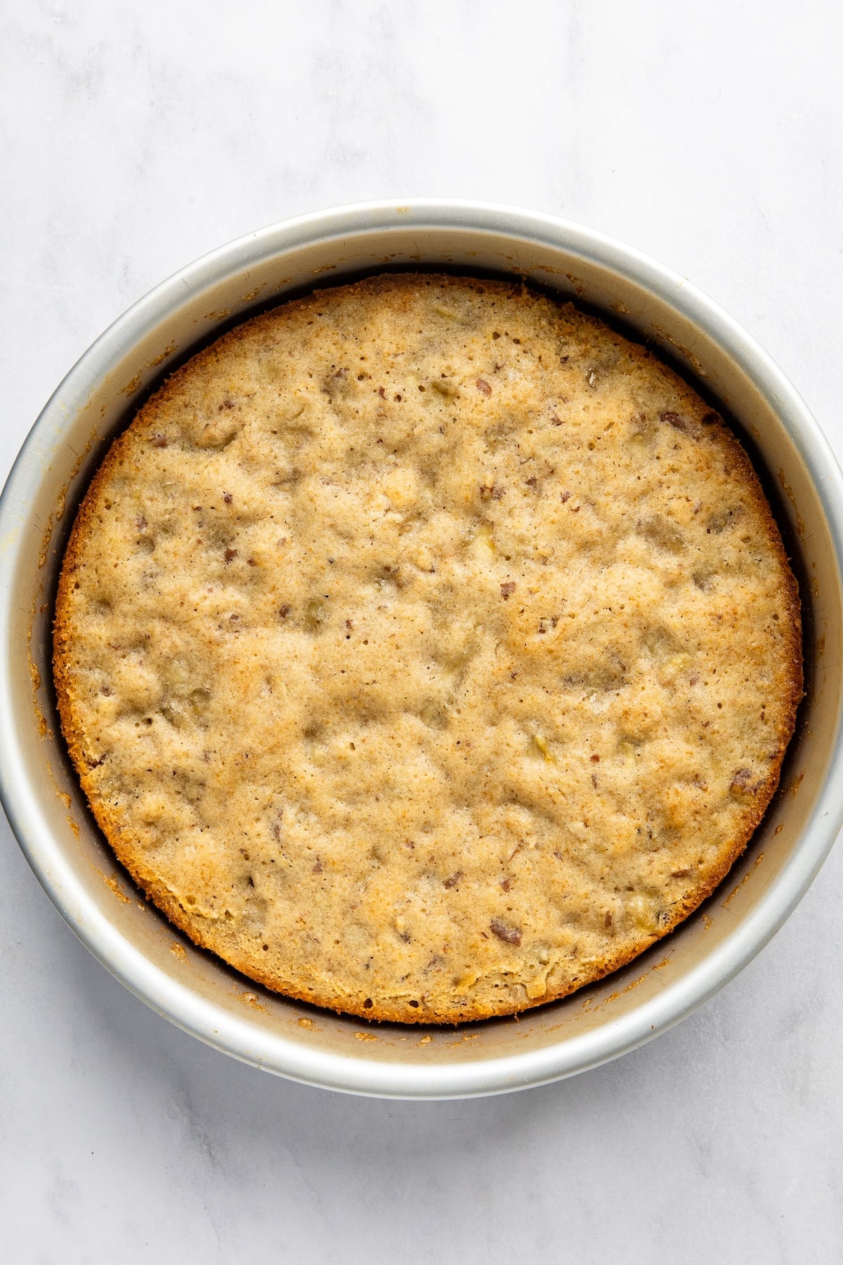 one 9-inch round cake pan with baked cake