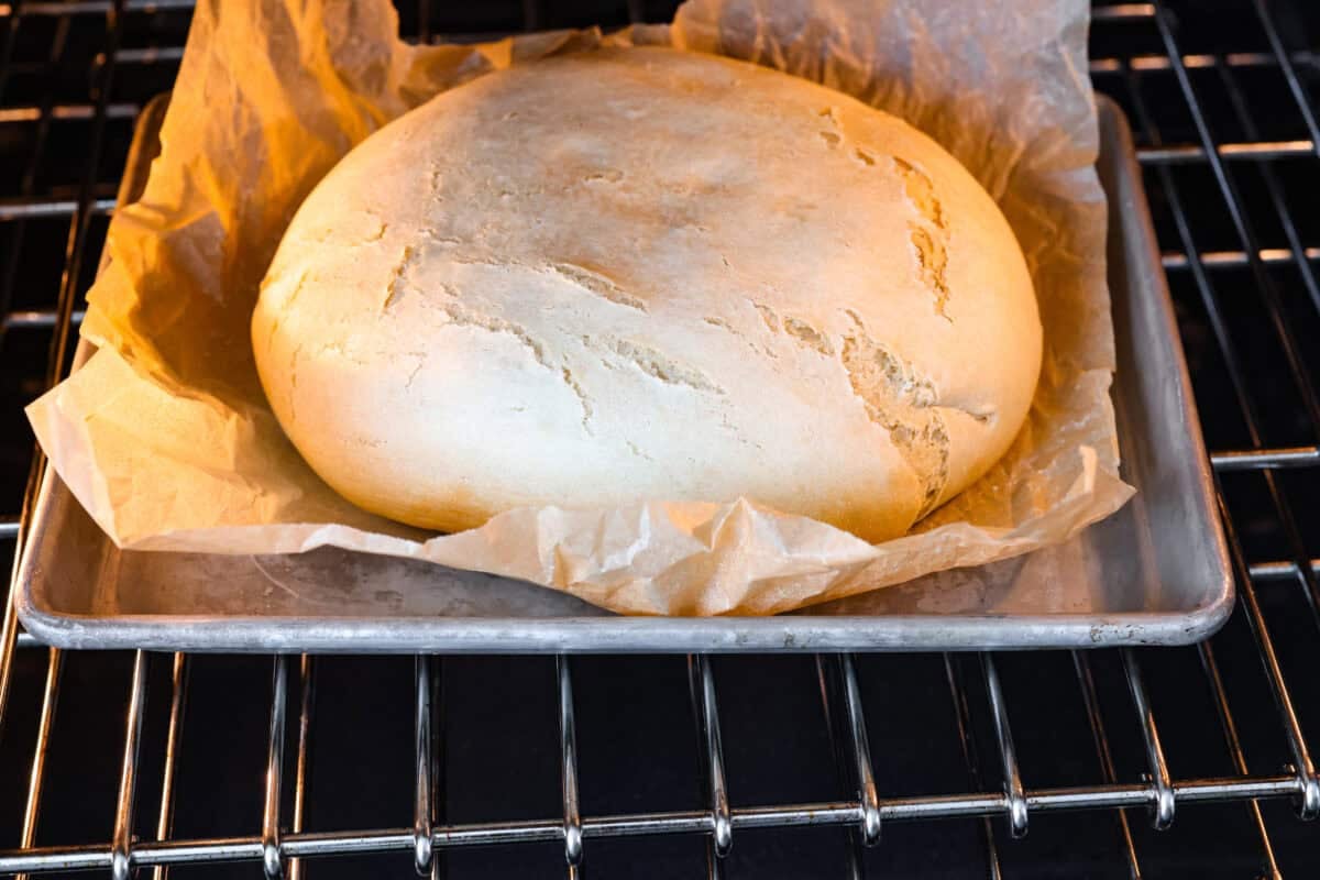 Cooked slow cooker bread in the oven to get a golden crust on the top.