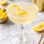 French 75 cocktail with lemon twist