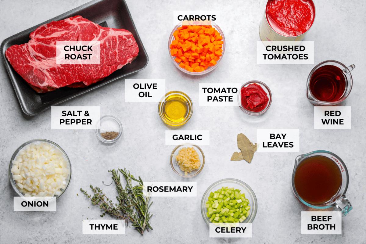 Overhead shot of labeled Italian pot roast ingredients. 