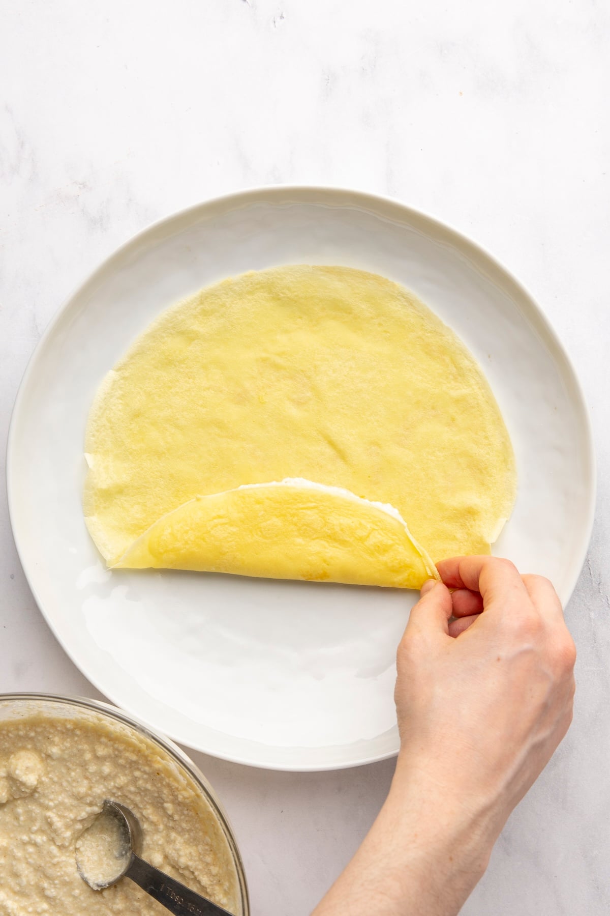 bottom edge of crepe folded over filling