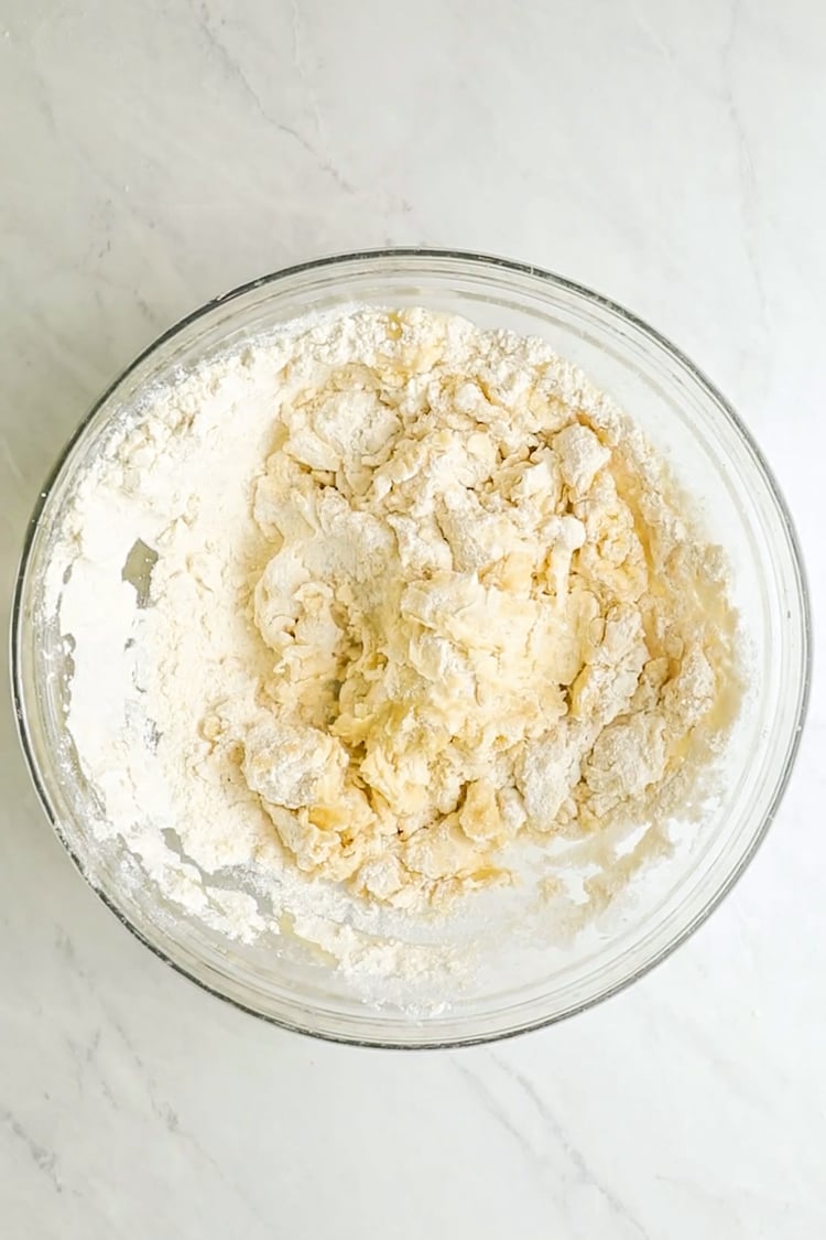 shaggy mass of deep dish pizza dough