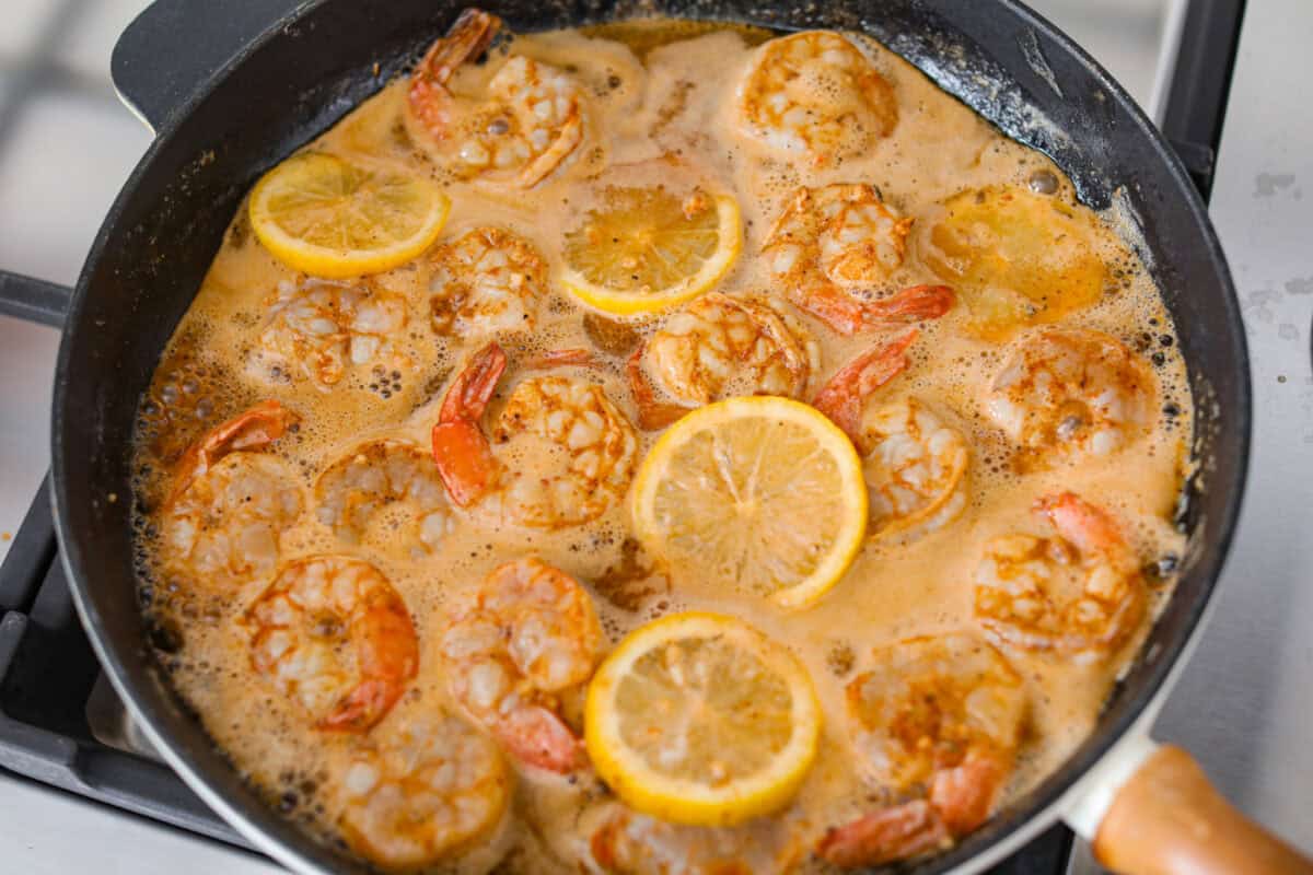 Worcestershire sauce and lemon added to the skillet.