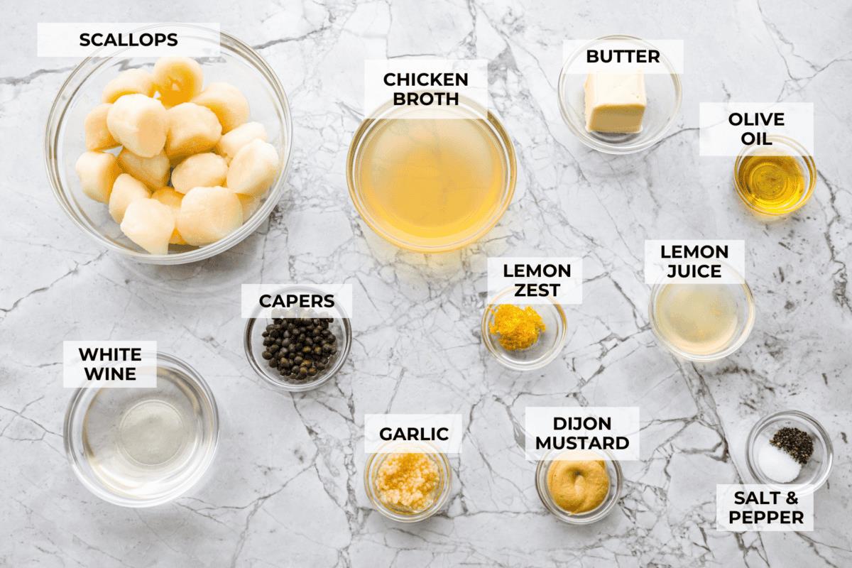 Overhead shot of labeled pan seared scallops ingredients. 