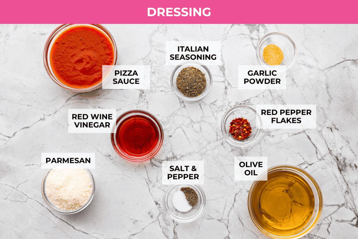 Overhead shot of labeled dressing ingredients. 
