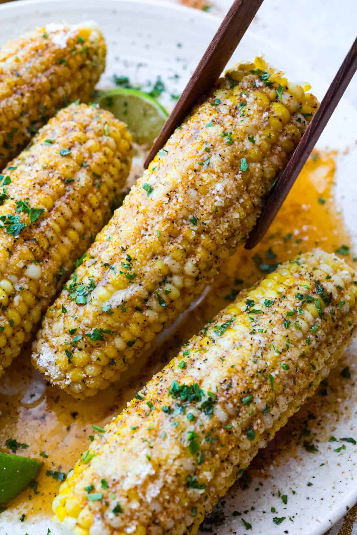 Close up of cajun corn on the cob.
