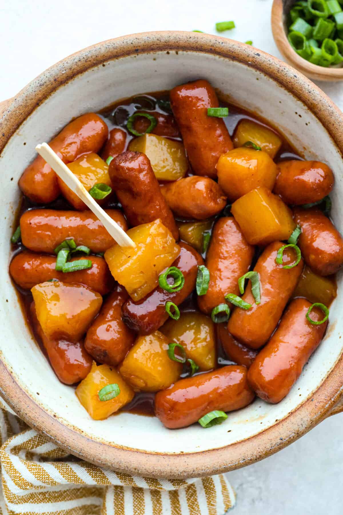 Bowl of hawiian lil' smokies.